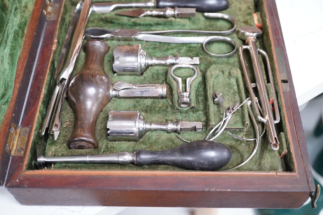 A mahogany cased Georgian medical trepanning set by William Haseldine Pepys FGS FRS (1775-1856), comprising steel drill bits, tool holders, forceps, etc. the forceps stamped W. Pepys, dimensions of the case; 20cm wide, 5